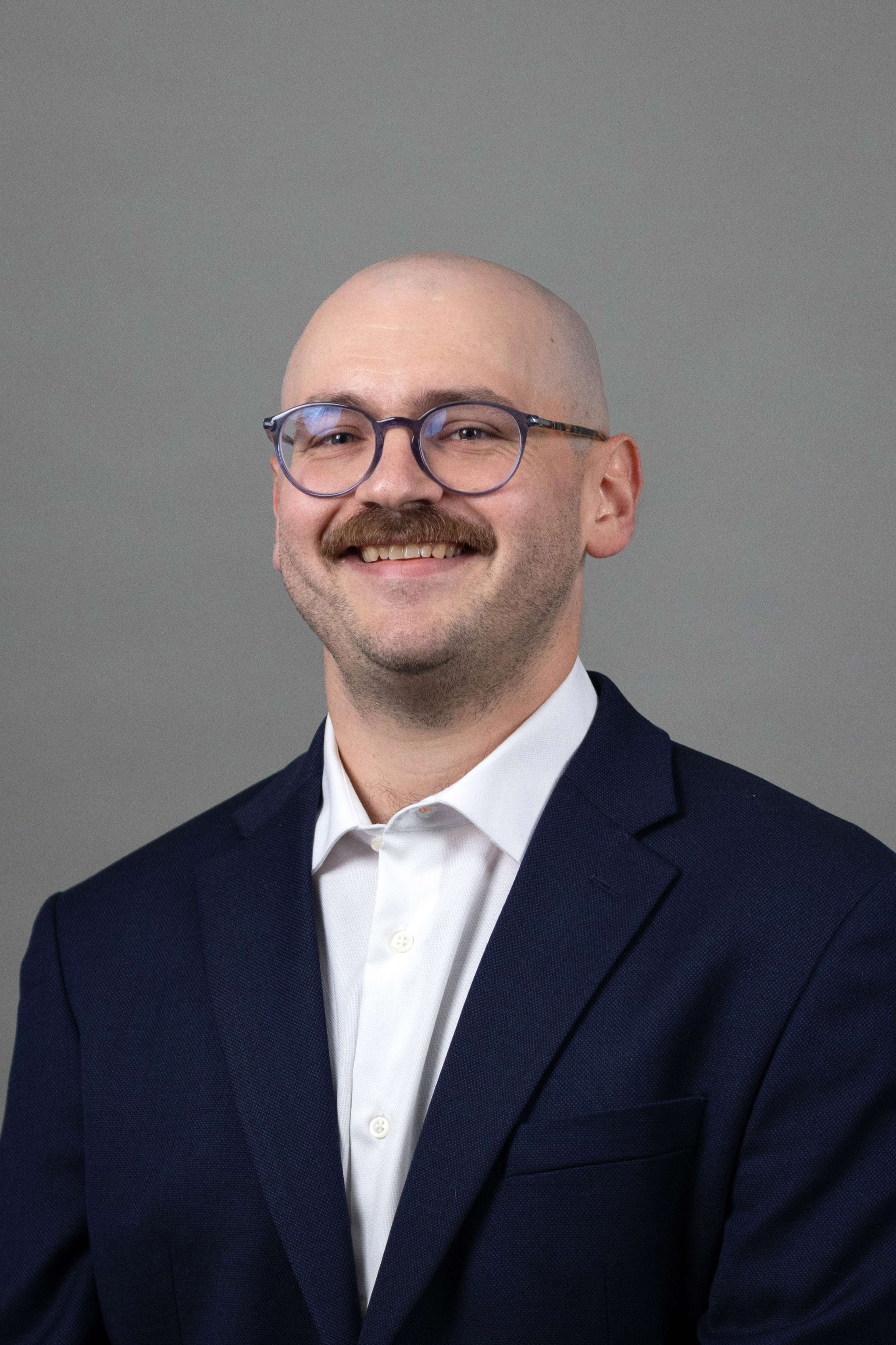 Headshot placeholder — replace with your own photo